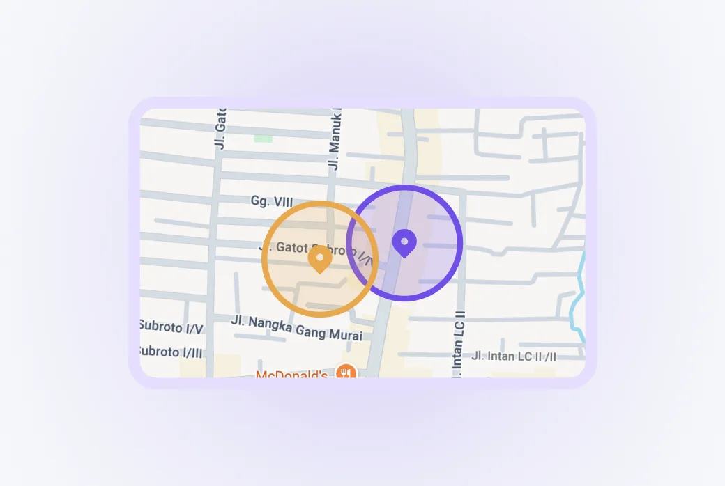 Screenshot beberapa zona notifikasi di peta — satu di sekitar bisnis, satu di sekitar lokasi kompetitor.